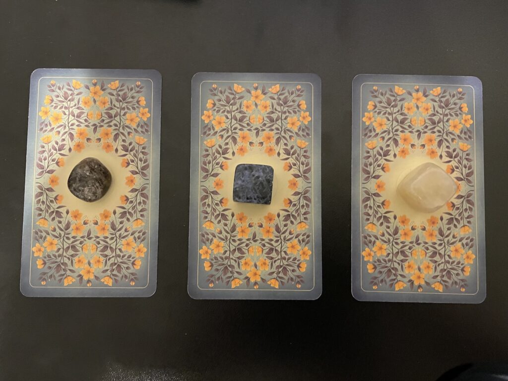 Backs of three oracle cards